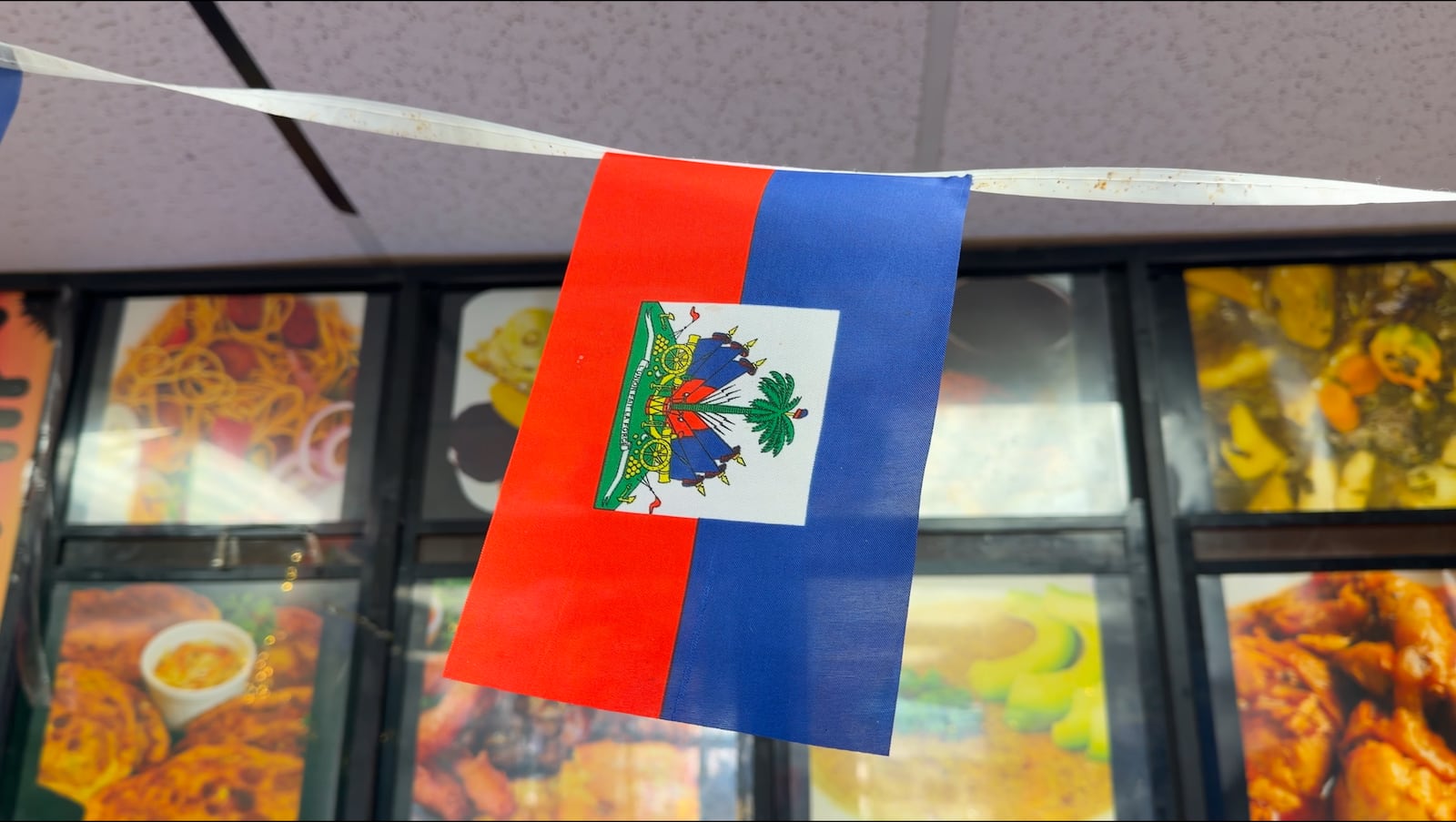 A flag hangs inside Keke Bon Gou off Sunset Avenue in Springfield.