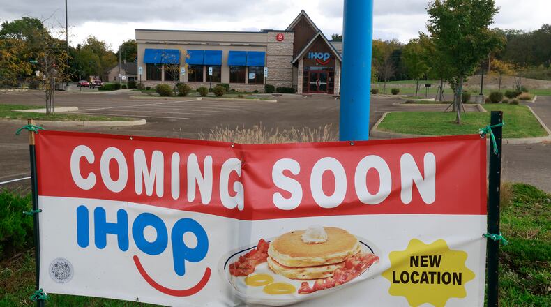 A new sign, indicating that a new IHOP will be opening soon, is displayed in front of the old IHOP location Monday, Oct. 14, 2024. BILL LACKEY/STAFF