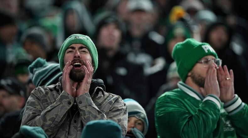 Philadelphia Eagles fans react negatively during the second half of an NFL football game against the Chicago Bears, Friday, Nov. 28, 2025, in Philadelphia. (AP Photo/Matt Slocum)
