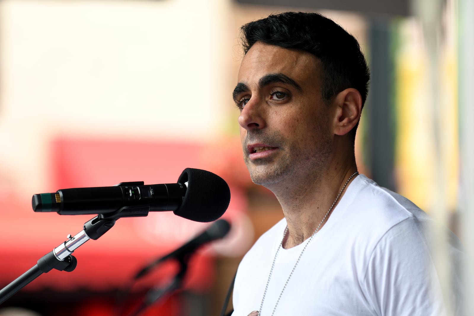 Moshe Lavi, whose brother-in-law, Omri Miran, is being held hostage in Gaza, speaks at a rally in Boulder, Colo., on Sunday, June 8, 2025. (AP Photo/Thomas Peipert)