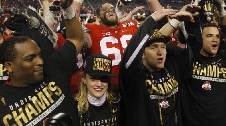 Ohio State’s Taylor Decker sings “Carmen Ohio” after a victory against Oregon in the national championship game on Monday, Jan. 12, 2015, at AT&T Stadium in Arlington, Texas. David Jablonski/Staff