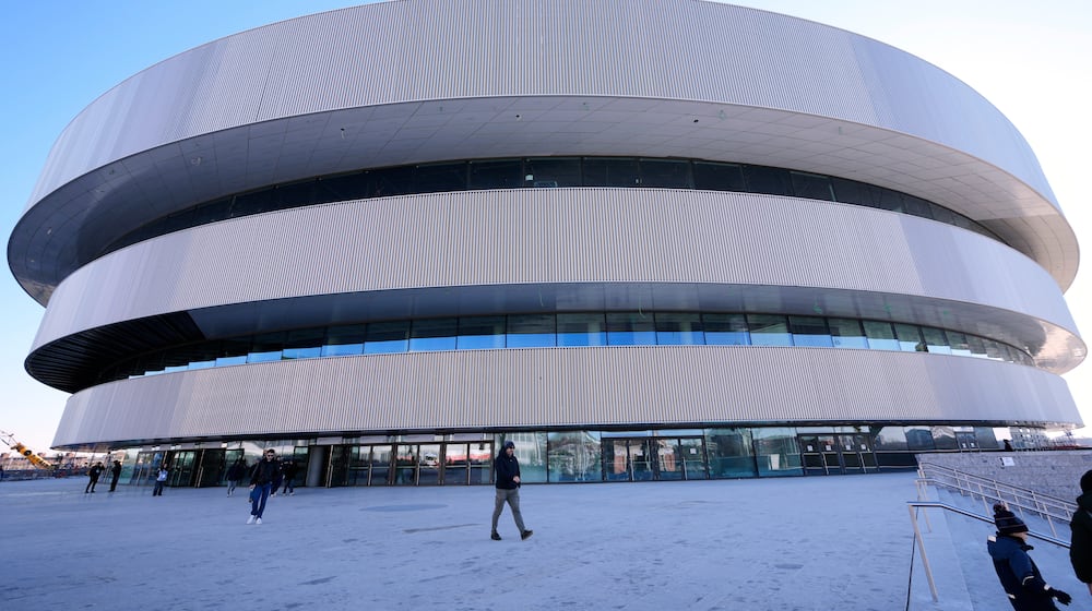 An outside view of the Santa Giulia Ice Hockey Arena, in Milan, where Ice Hockey discipline of the Milan Cortina 2026 Winter Olympics will take place, in Milan, Italy, Sunday, Jan. 11, 2026. (AP Photo/Luca Bruno)