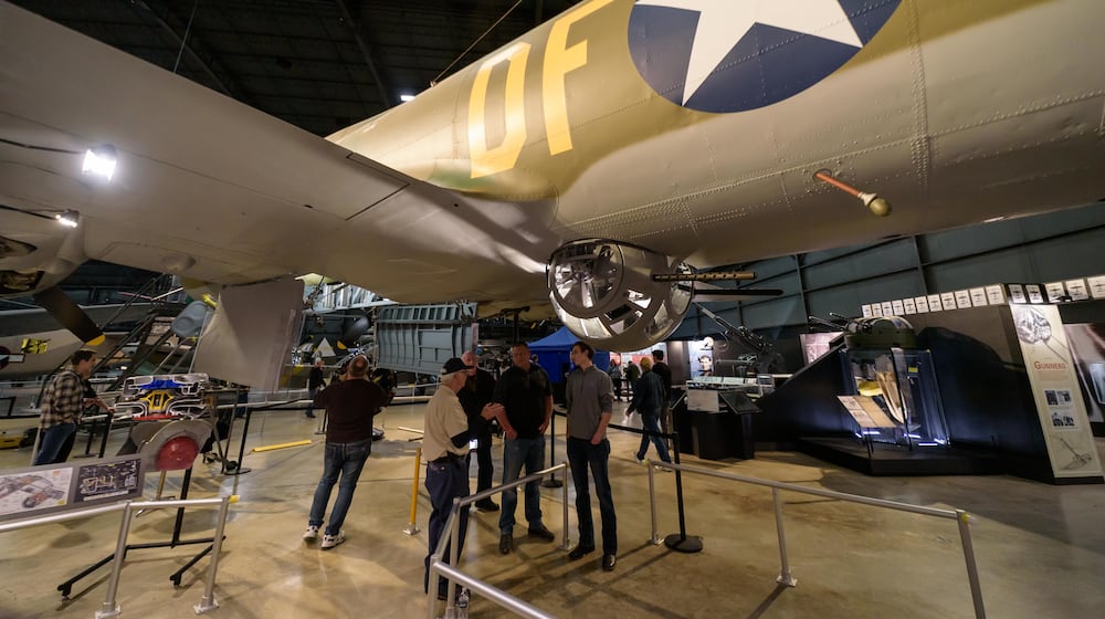 After Dark: Bombers & Brews happened at the National Museum of the U.S. Air Force on Saturday, Nov. 8, 2025. Hosted by the Air Force Museum Foundation, the ticketed after-hours 21 and up ticketed event featured food, games, trivia, caricature artist, cash bar, live music by 5 and beer samples from Fifth Street Brewpub, Heavier Than Air Brewing Co. and Warped Wing Brewing Company. Attendees had up close and personal encounters with the Memphis Belle (look-in), EC-121D Constellation (open aircraft), Boeing B-1B Lancer (open aircraft) and the Convair B-58 Hustler (look-in). TOM GILLIAM / CONTRIBUTING PHOTOGRAPHER