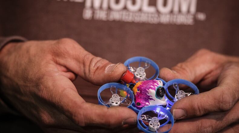 Micro-drones will race at the USAF Museum Saturday. Spectators will be able to watch the race along the course in the museum's second building.
race organizer, Kele Stanley flies a drone for the media to promote their Saturday drone race at the USAF Museum.