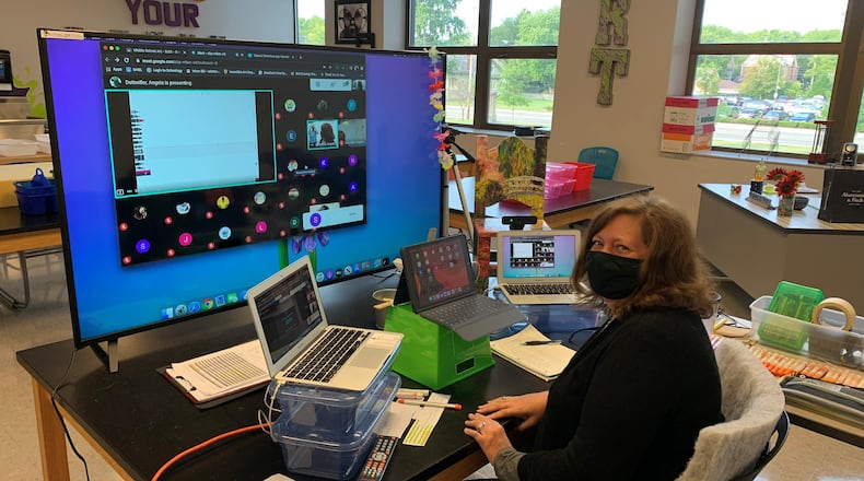 Global Impact STEM Academy Middle School Art Instructor, Ms. Angela Detwiller, connects with her students remotely from her classroom. CONTRIBUTED