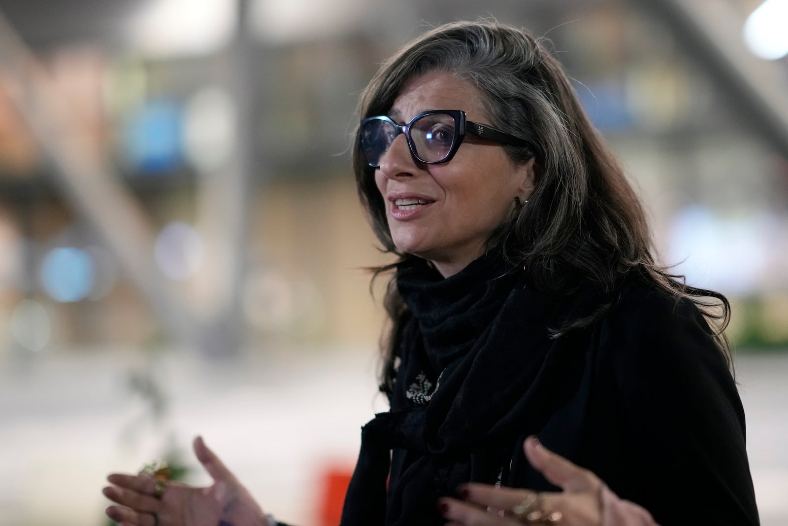 U.N. Special Rapporteur for the Occupied Palestinian Territories Francesca Albanese talks to The Associated Press at the Sarajevo airport in Sarajevo, Bosnia and Herzegovina, Thursday, July 10, 2025, on her way to events commemorating the 30th anniversary of the Srebrenica genocide. (AP Photo/Darko Bandic)