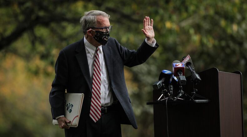 Ohio Gov. Mike DeWine talks to the press Friday October 9, 2020 at the Patterson Homestead on Brown St. in Dayton. DeWine traveled around Ohio on Friday because he was worried about the recent COVID-19 up tick. JIM NOELKER/STAFF