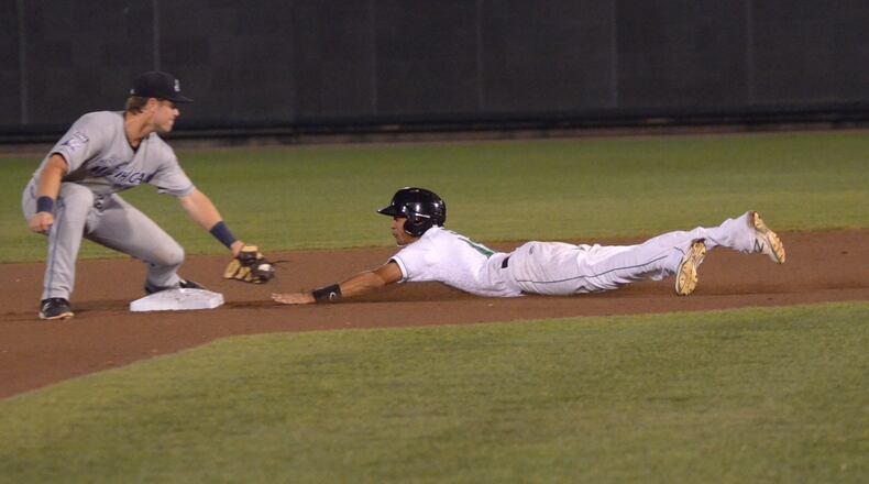 Jose Siri of the Dayton Dragons steals second in the eighth inning against the West Michigan Whitecaps on Thursday night at Fifth Third Field. BRIAN SWARTZ / CONTRIBUTED