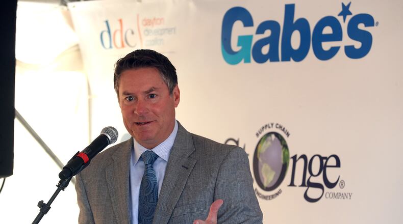 Mike McDorman, president and CEO of the Greater Springfield Partnership, speaks during a groundbreaking ceremony for the new Gabe's distribution center in this 2021 file photo. BILL LACKEY/STAFF