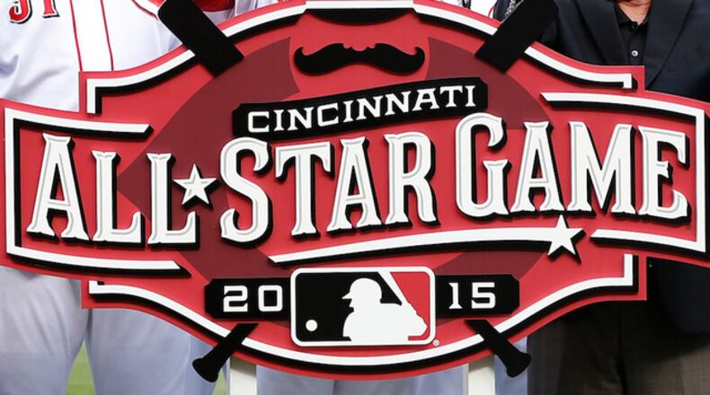 Cincinnati Reds owner Bob Castellini and general manager Walt Jocketty unveil the 2015 All Star Game logo prior to the game against the Cleveland Indians at Great American Ball Park on August 6, 2014 in Cincinnati, Ohio. (Photo by Joe Robbins/Getty Images)