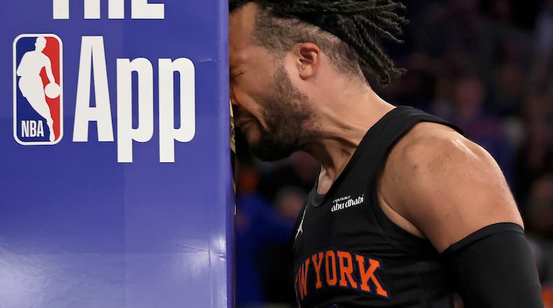 New York Knicks guard Jalen Brunson reacts after being fouled during the second half of an NBA Cup basketball game against the Milwaukee Bucks, Friday, Nov. 28, 2025, in New York. (AP Photo/Adam Hunger)