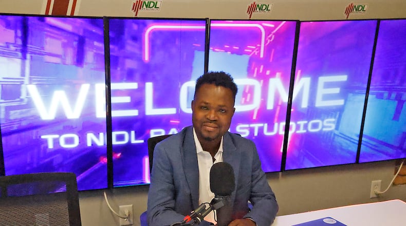 Gilbert Fortil, one of the owners of New Diaspora Live, in their new studio at the Springfield COhatch Friday, Sept. 13, 2024. BILL LACKEY/STAFF