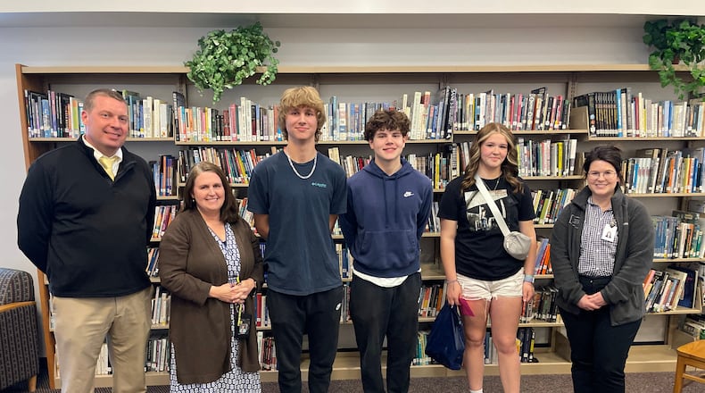 Three Clark-Shawnee videography students won the top three spots in the Clark County Combined Health District’s (CCCHD) Anti-Vaping Video Contest. From left to right: Shawnee High School Principal Chad Mossing, Shawnee High School Videography Teacher Brigitte Williams, second place winner Caleb Burris, first place winner Mitchell Danber, third place winner Teagen Stienecker and CCCHD Leah Behler. Contributed