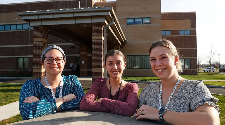 Some of the members of the "Youth Team" at Mental Health Services for Clark and Madison Counties, from left, Erika Hannah, Arielle Wenig and Bethany Williams Tenhundfeld, in front of the new Youth Services section, which doubled the nonprofit's capacity of treatment for young people. The organization offers outpatient treatments, therapy and educational support to young people in the area who are seeking mental health services. BILL LACKEY/STAFF