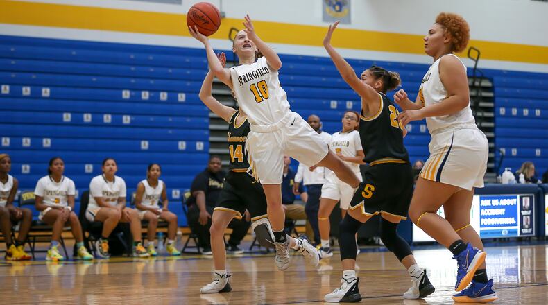 Springfield High School freshman Brooke Nelson drives to the hoop during their game against Shawnee on Nov. 20 in Springfield. Michael Cooper/CONTRIBUTED