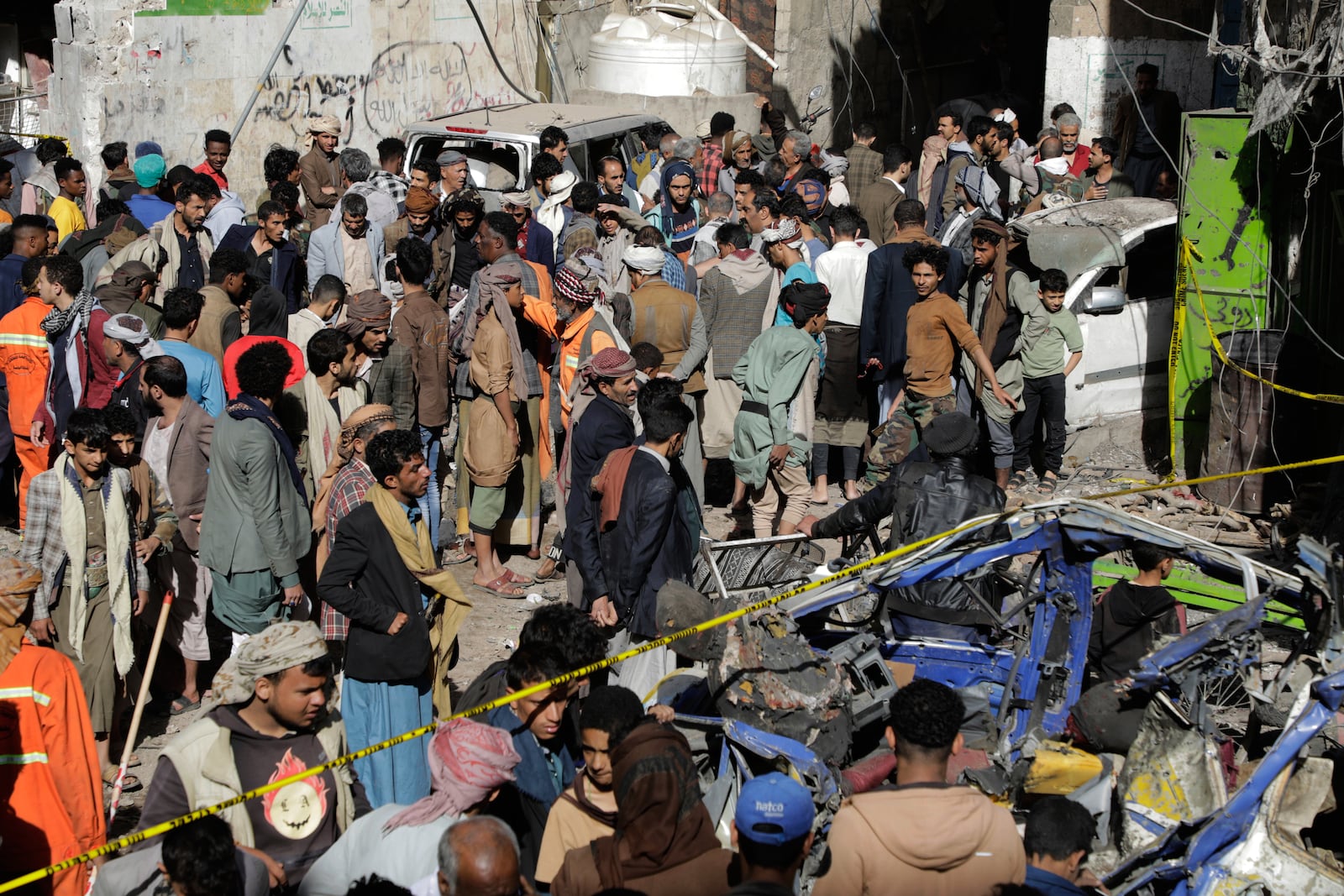 Yemenis crowd at Farwah popular market, which Houthis said was struck by U.S. airstrikes, in Sanaa, Yemen, Monday, April 21, 2025. (AP Photo)