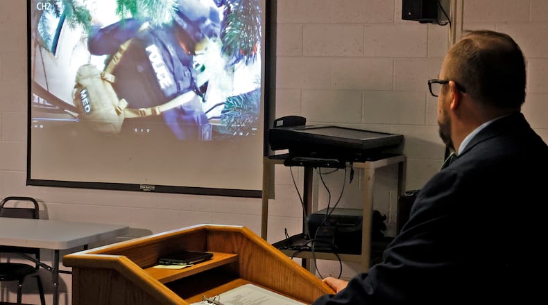 Clark County Prosecutor Dan Driscoll shows a video Wednesday, Feb. 8, 2023, of the incident at Harmony Estates Mobile Home Park on July 24, 2022, during a press conference. BILL LACKEY/STAFF