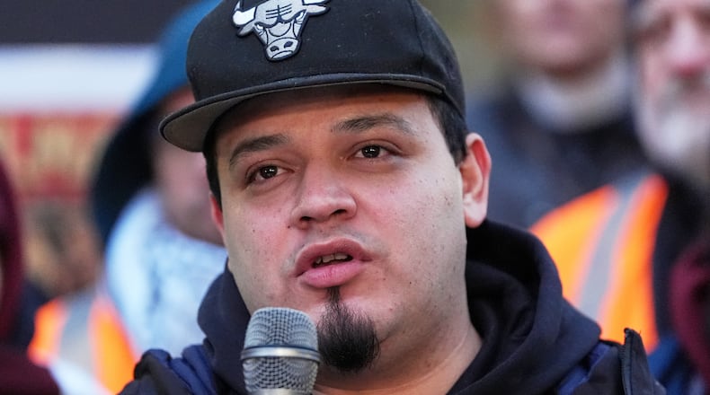 FILE - Kilmar Abrego Garcia speaks during a rally ahead of a mandatory check at the Immigration and Customs Enforcement office in Baltimore, Dec. 12, 2025. (AP Photo/Stephanie Scarbrough, File)