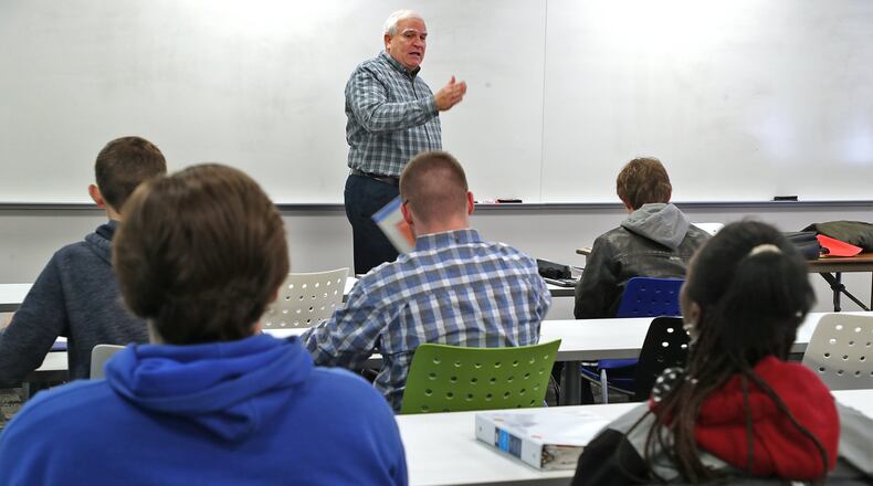 Clark State has saved students thousand of dollars on tuition by challenging them to go to school full time and be successful. BILL LACKEY/STAFF