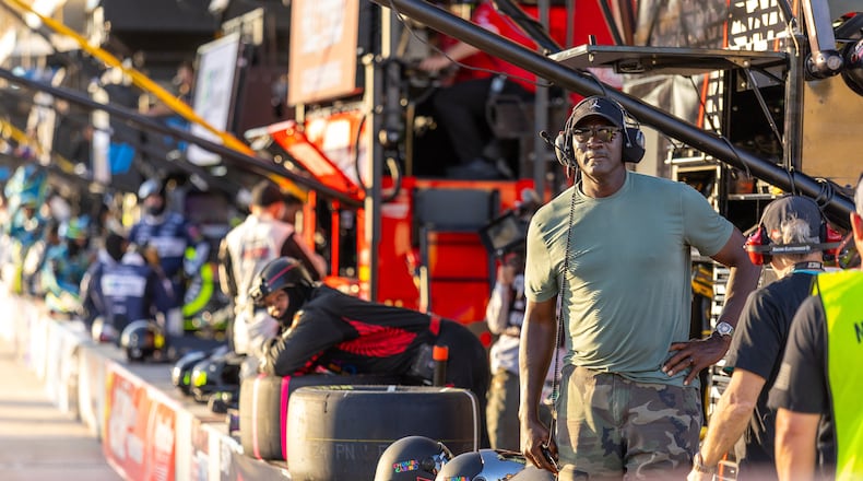 23XI Racing's team co-owner Michael Jordan watches the final laps by Tyler Reddick during a NASCAR Cup Series auto race in Austin, Texas, Sunday, March 1, 2026. (AP Photo/Stephen Spillman)