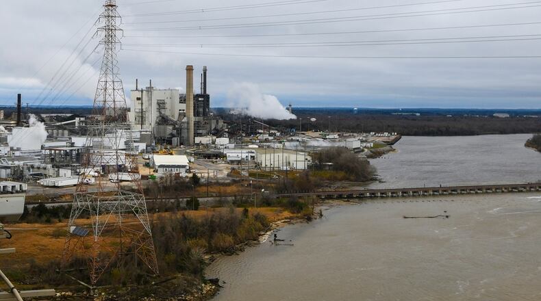 FILE - Industrial development is seen along the Mobile River near Mobile, Ala., on Jan. 29, 2019. (AP Photo/Julie Bennett, File)