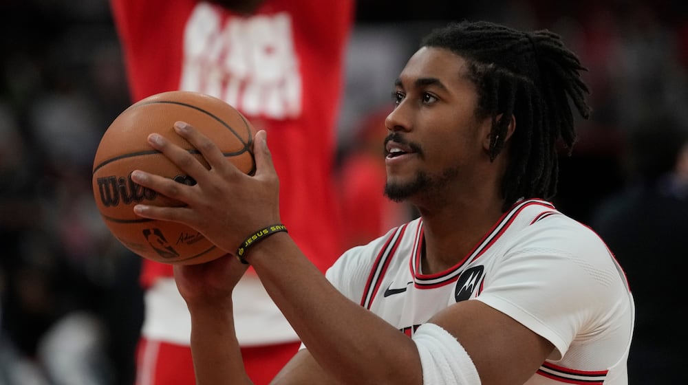 FILE - Chicago Bulls guard Jaden Ivey warms up before an NBA basketball game against the Toronto Raptors, Thursday, Feb. 19, 2026, in Chicago. (AP Photo/Erin Hooley, File)