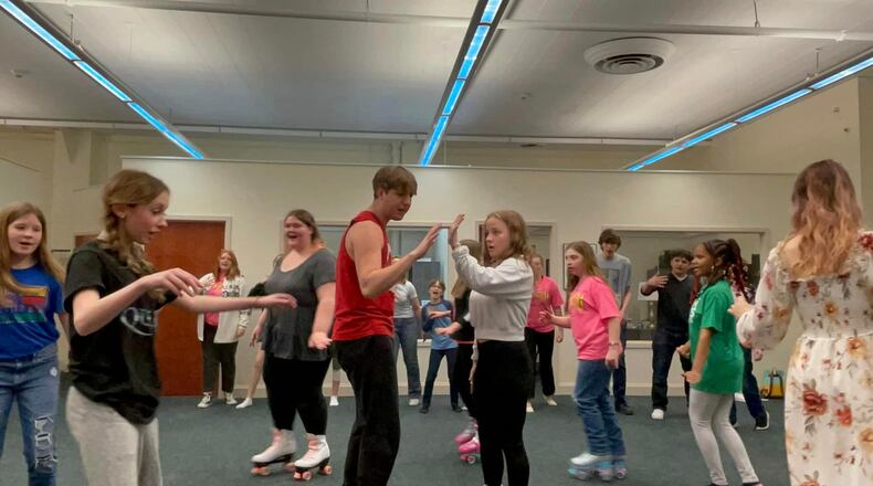 Some of the Youth Arts Ambassadors rehearse in roller skates for the upcoming presentation of "Xanadu, Jr." this weekend at the John Legend Theater.
