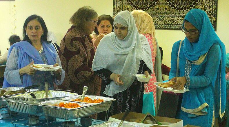 Local Muslim families celebrate the end of the Islamic Holiday Ramadan in Springfield. JEFF GUERINI/STAFF
