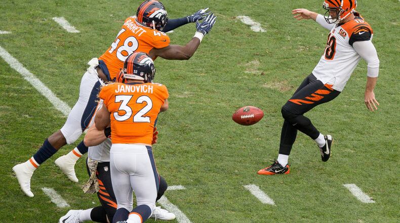 DENVER, CO - NOVEMBER 19: Outside linebacker Shaquil Barrett #48 of the Denver Broncos blocks a punt by punter Kevin Huber #10 of the Cincinnati Bengals in the first quarter of a game at Sports Authority Field at Mile High on November 19, 2017 in Denver, Colorado. (Photo by Justin Edmonds/Getty Images)