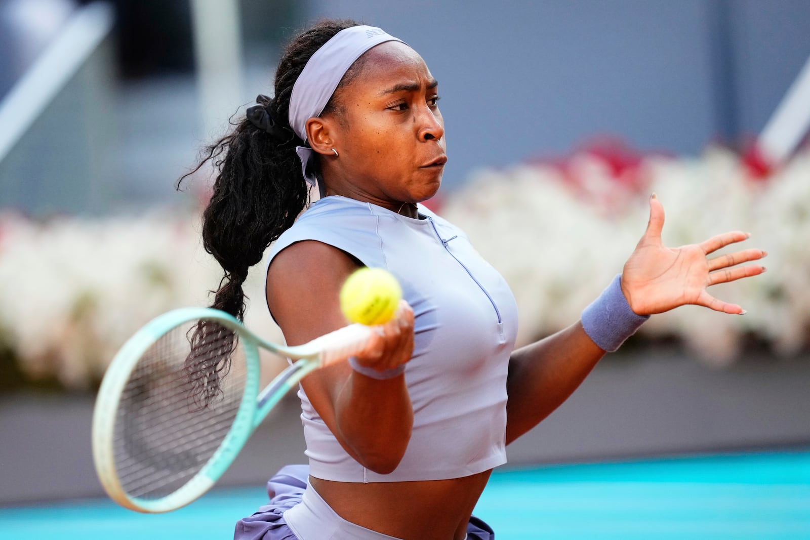 United States' Coco Gauff returns to Aryna Sabalenka of Belarus during the Madrid Open tennis final in Madrid, Spain, Saturday, May 3, 2025. (AP Photo/Jose Breton)