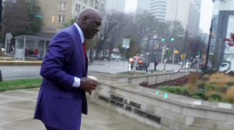 Michael Jordan arriving to federal courthouse to testify in NASCAR antitrust case on Friday, Dec. 5, 2025 in Charlotte, N.C. (AP Photo)