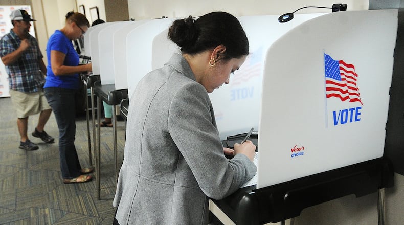 In summer 2023, at the Miami County board of elections office, Maddie Logan votes on a statewide ballot issue that would have made it harder for Ohioans to change the state constitution via citizen petition. That ballot issue was rejected. MARSHALL GORBY\STAFF