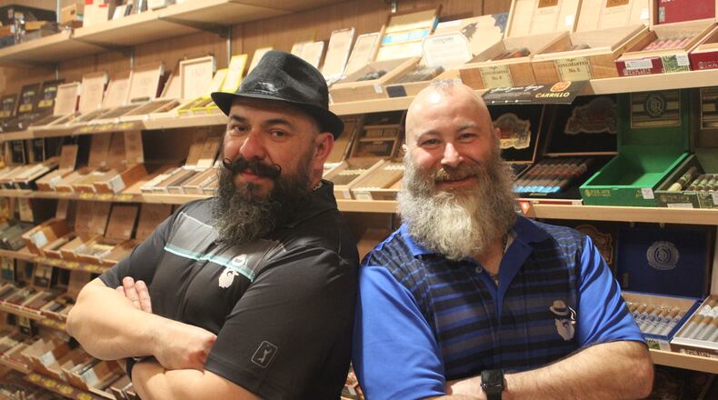 Gonzo Gonzales (right) and his husband Bryan Emerson (left) celebrated  the grand opening of B&G's Cigar Lounge on Feb. 7, 2020. It was  Super Bowl weekend.