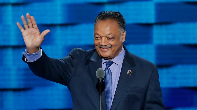 FILE - Rev. Jesse Jackson waves as he steps to the podium during the third day of the Democratic National Convention in Philadelphia, July 27, 2016. (AP Photo/J. Scott Applewhite)