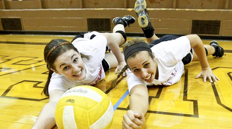 Senior middle hitter Karrah Batten (right) and junior outside hitter Taylor Brown (left), both three-year varsity standouts, return to spark a loaded Kenton Ridge H.S. volleyball team. Barbara J. Perenic/Staff