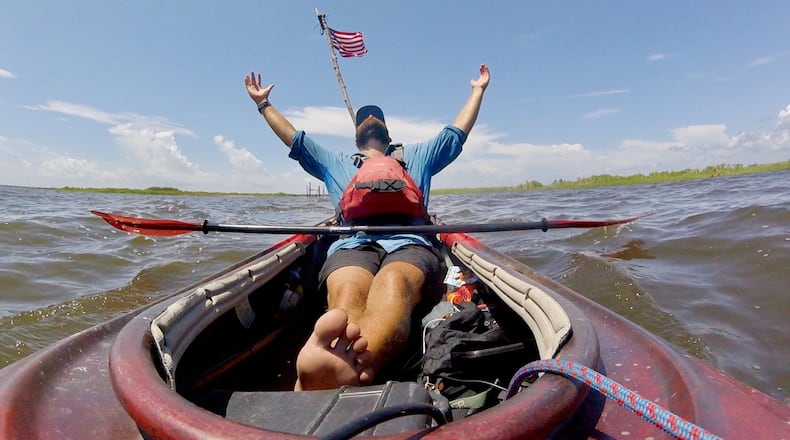 Wittenberg graduate Andy Gallatin takes a photof himself during his 3,052-mile kayak trip. Submitted photo