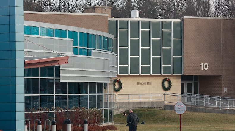 A Student walk across campus at Clark State College Tuesday, Dec. 13, 2022. BILL LACKEY/STAFF