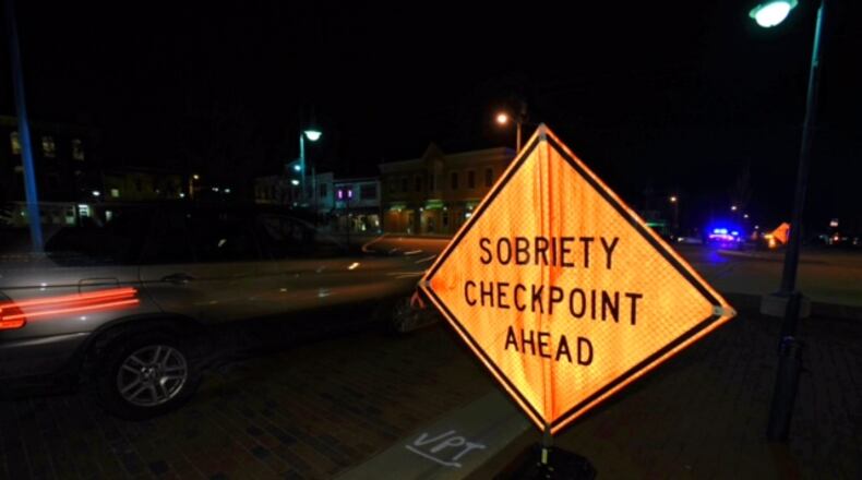 The Butler County OVI Task Force works a sobriety checkpoint in Oxford from 7 to 10 a.m. Thursday, March 16, 2017. NICK GRAHAM/STAFF