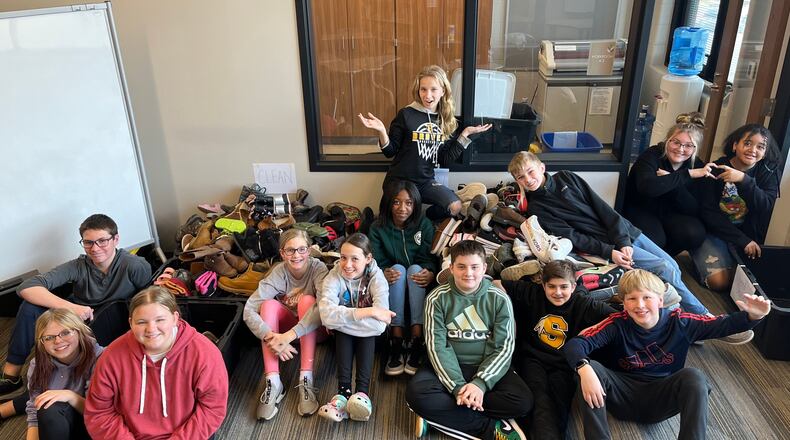 Shawnee Elementary School students collected over 300 shoes to donate to the Springfield and Clark County community. Contributed