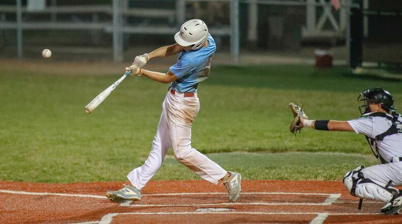 Kenton Ridge High School graduate and Armorloy outfielder Calvin Dibert swings the bat during their game against the Springfield Warhawks on July 17 at Carleton Davidson Stadium. Michael Cooper/CONTRIBUTED