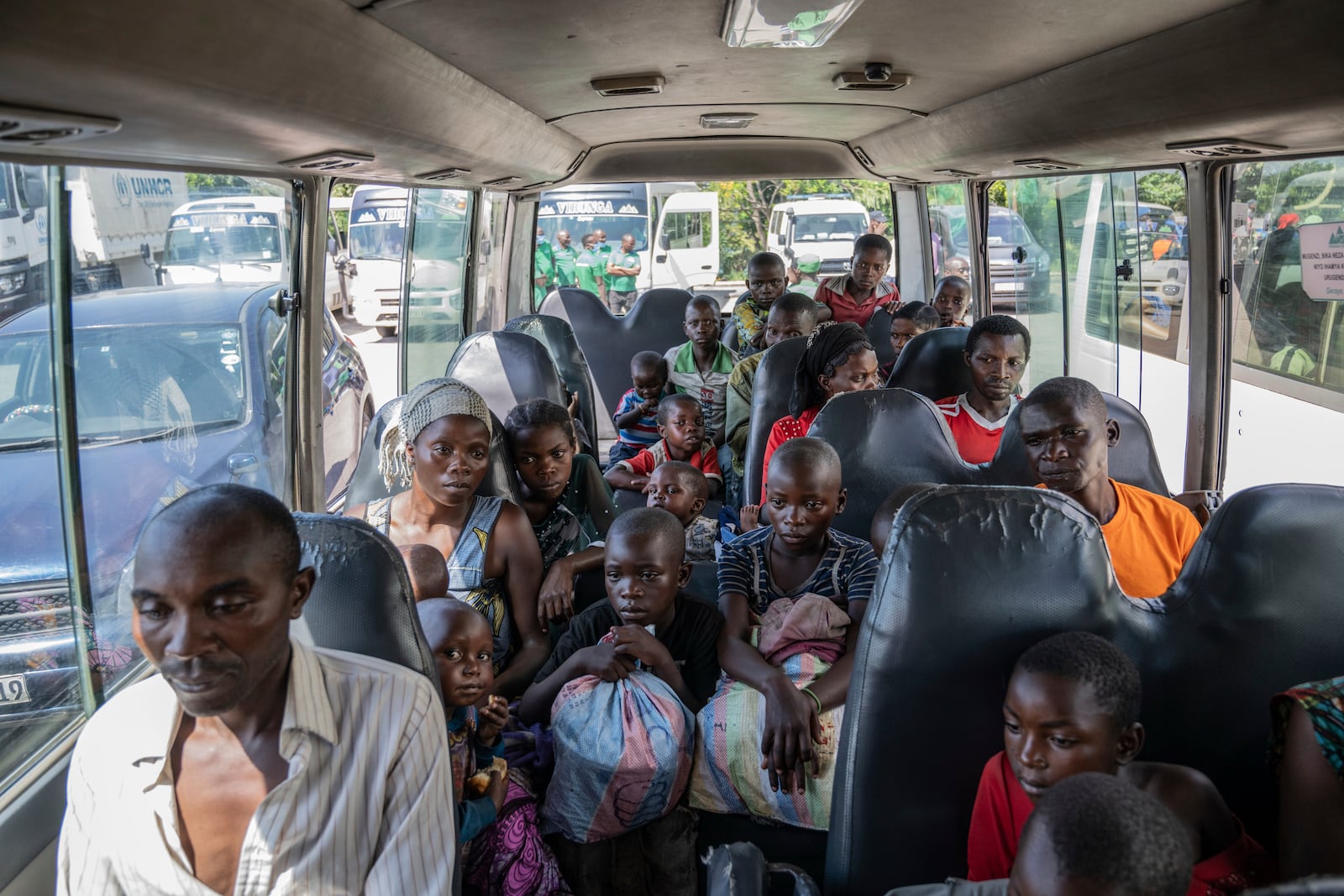 Rwandan refugees who were living in eastern Congo since the 1994 Rwanda genocide are repatriated by bus from Goma, Democratic Republic of the Congo, on Saturday, May 17, 2025. (AP Photo/Moses Sawasawa)