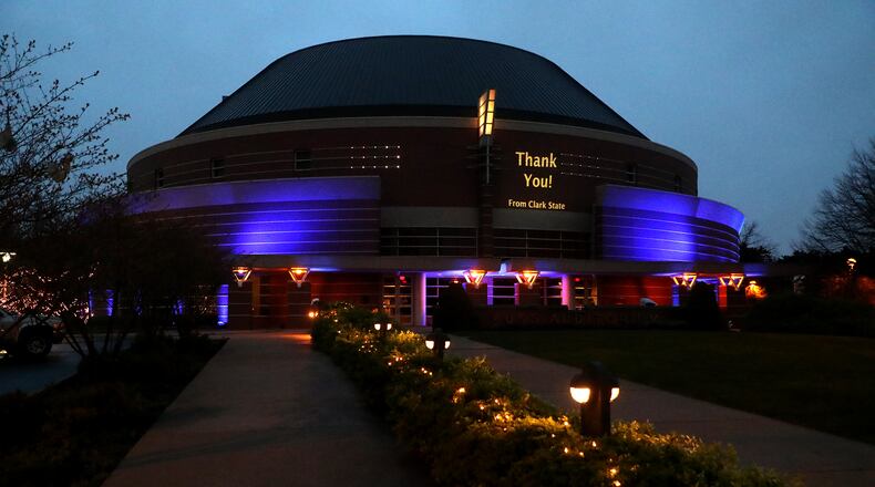 Earlier this year, the Clark State Performing Arts Center was illuminated in blue with messages honoring and expressing gratitude to healthcare workers, first responders and essential workers on the front lines of the coronavirus pandemic. The Light It Blue initiative was started in April as numerous Broadway theaters and other landmarks were bathed in blue. Tonight, the PAC will be illuminated in red to highlight the economic impact of the pandemic on the arts community. BILL LACKEY/STAFF