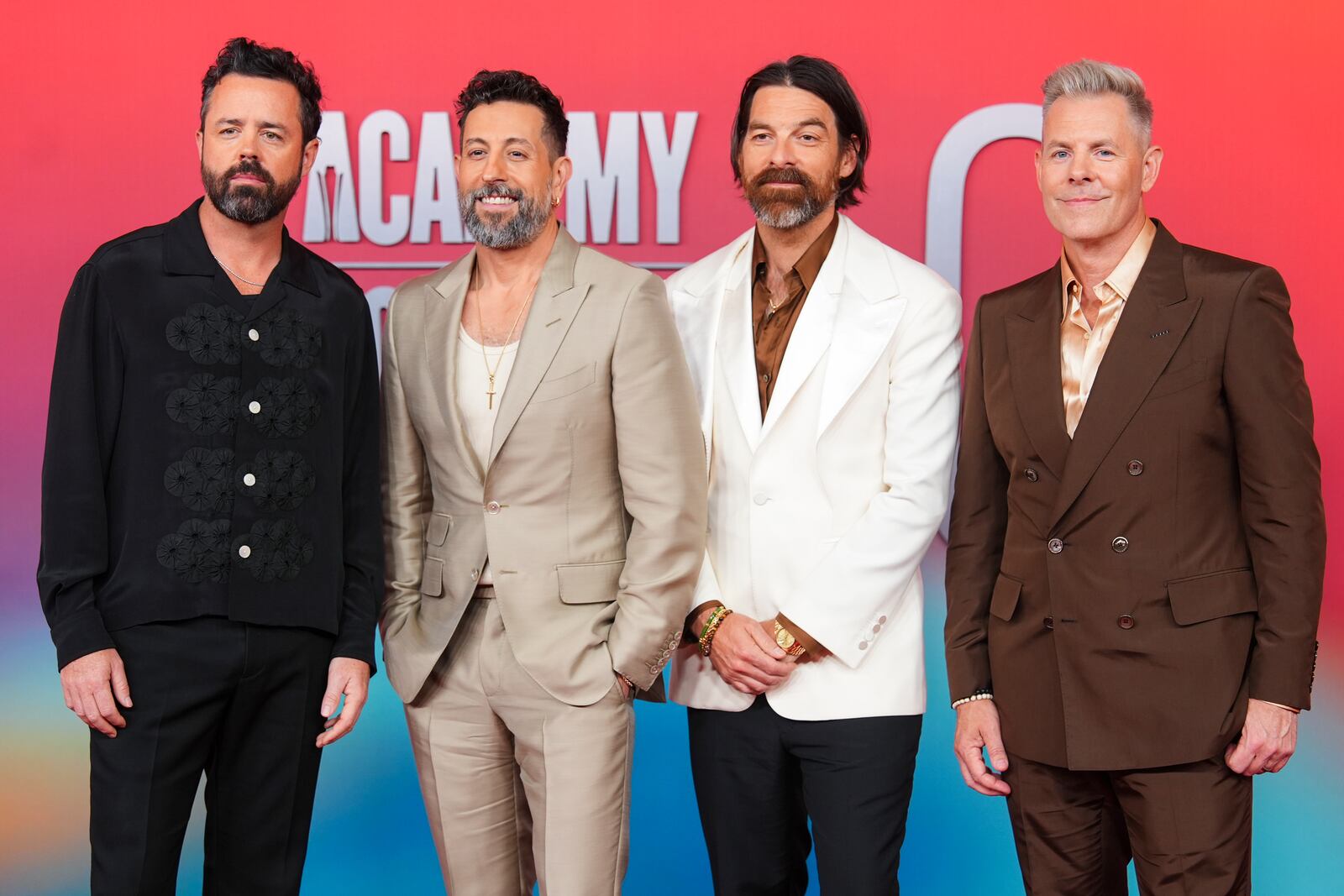 Brad Tursi, from left, Matthew Ramsey, Geoff Sprung, and Trevor Rosen, of Old Dominion, arrive at the 60th annual Academy of Country Music Awards on Thursday, May 8, 2025, in Frisco, Texas. (AP Photo/LM Otero)