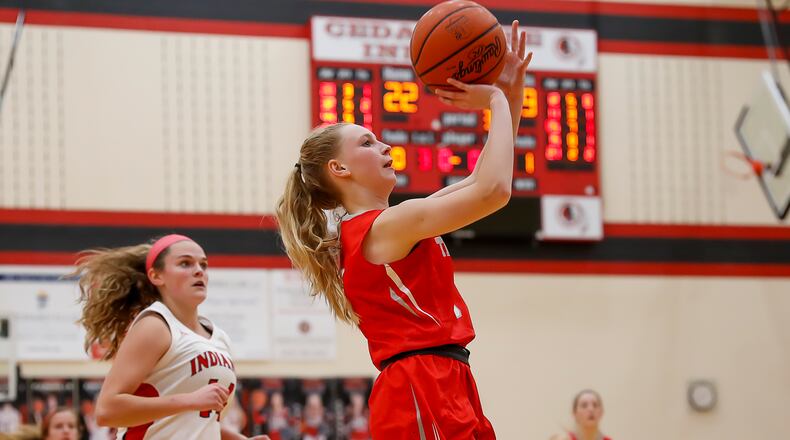 Southeastern High School junior Kelsey Vollrath shoots the ball during their game at Cedarville last season. The Trojans are 9-3 this winter. CONTRIBUTED PHOTO BY MICHAEL COOPER