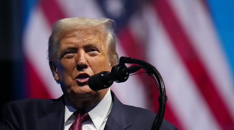 President Donald Trump speaks to the America Business Forum Miami, at the Kaseya Center, Wednesday, Nov. 5, 2025, in Miami. (AP Photo/Jacquelyn Martin)