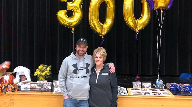 Mechanicsburg High School coach Christie Dodane poses for a photo with her husband Heath after her 300th career victory on Jan. 30. CONTRIBUTED PHOTO