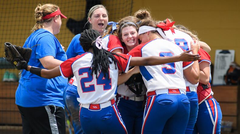 Northwestern’s players celebrate after the final out in a 10-6 win over Columbus Bishop Ready in a Division III regional final on Saturday at Wright State. It’s the first state appearance for the program since 2000. BRYANT BILLING / CONTRIBUTED