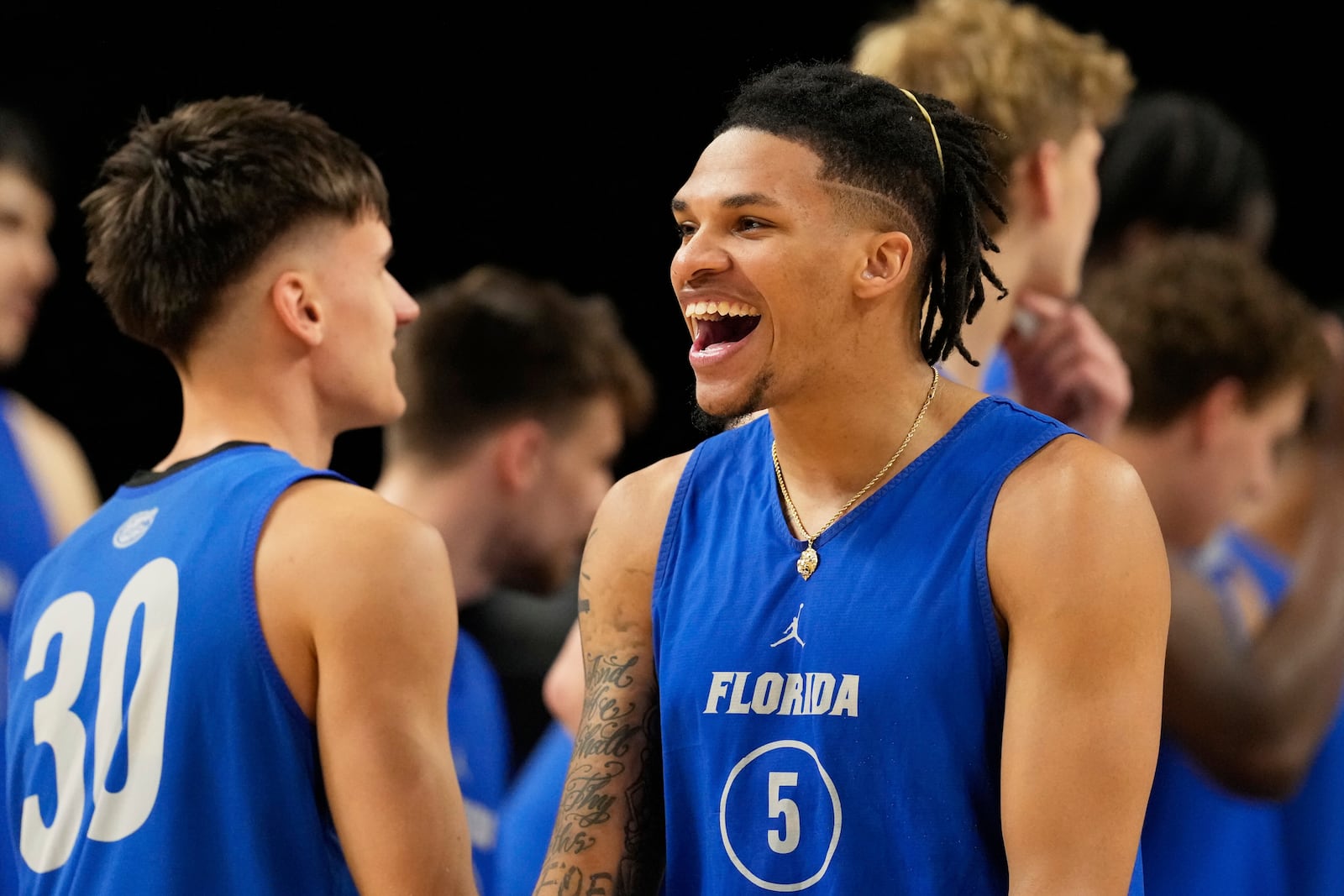 Florida guard Will Richard smiles during practice at the Final Four of the NCAA college basketball tournament, Friday, April 4, 2025, in San Antonio. (AP Photo/Brynn Anderson )