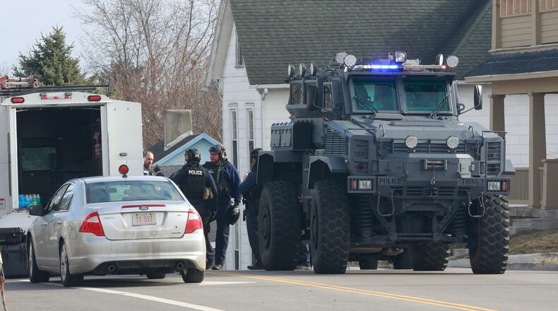 Police are on the scene of an “active SWAT situation” at a house in the 300 block of East McCreight Avenue. STAFF/BILL LACKEY