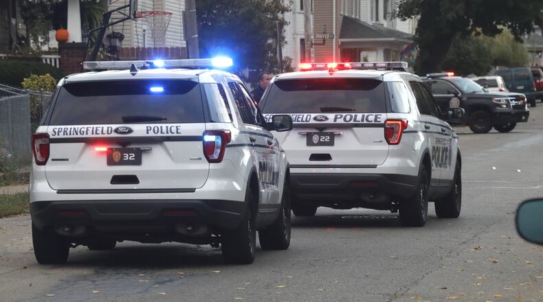 Police are investigating a shooting after a man was shot three times Monday, Oct. 12, 2012, on Cedar Street in Springfield. BILL LACKEY/STAFF